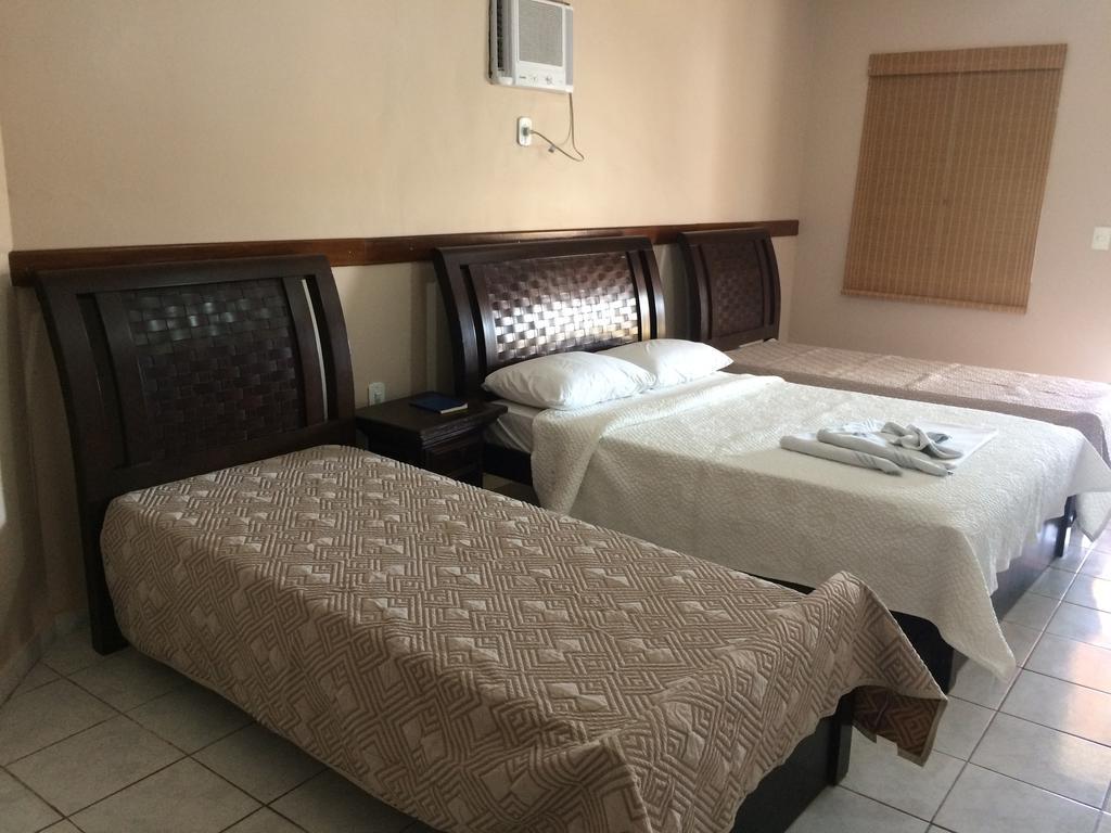 Hotel Pousada Caminho Da Praia กวาราปารี ภายนอก รูปภาพ