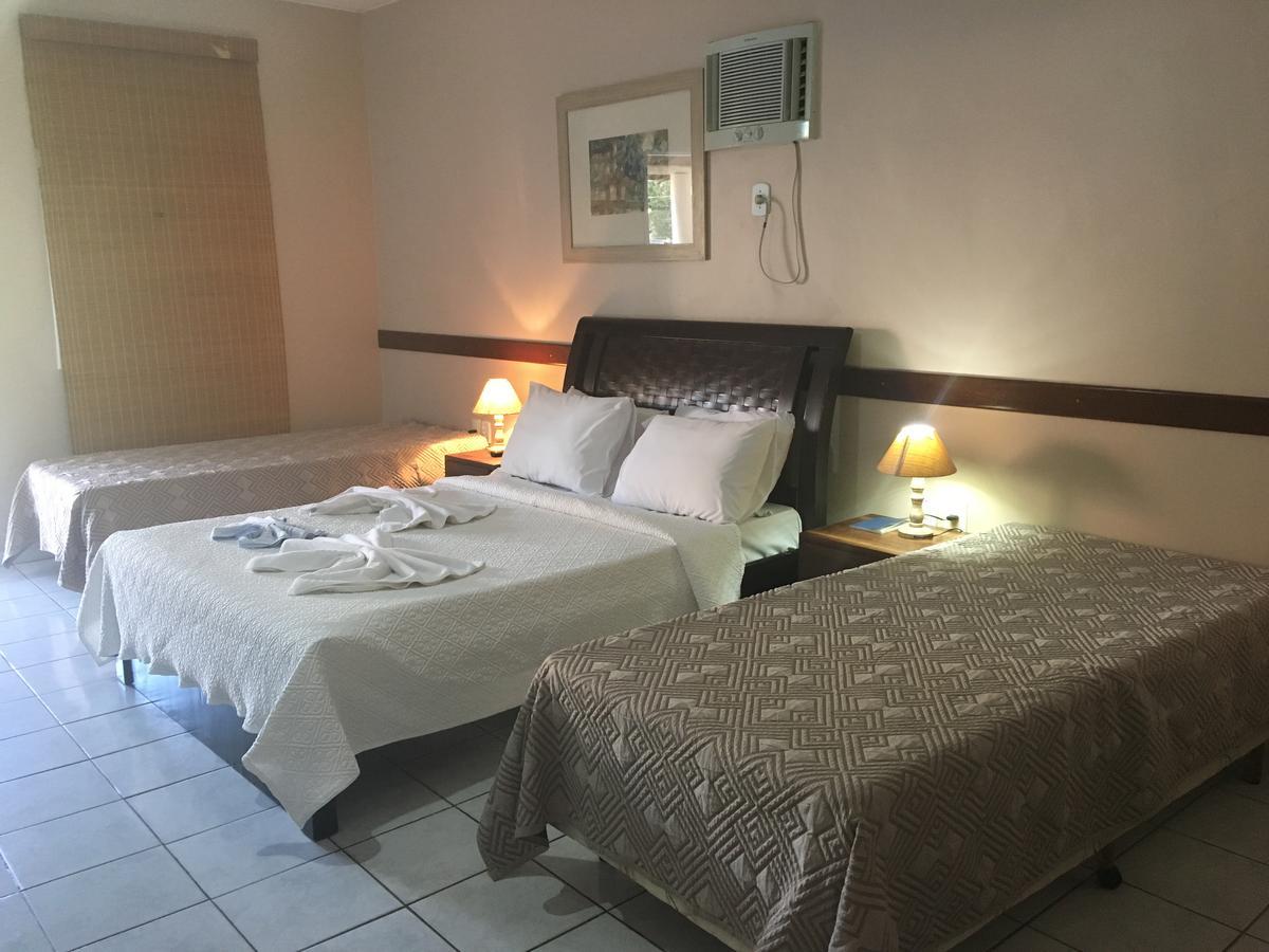 Hotel Pousada Caminho Da Praia กวาราปารี ภายนอก รูปภาพ