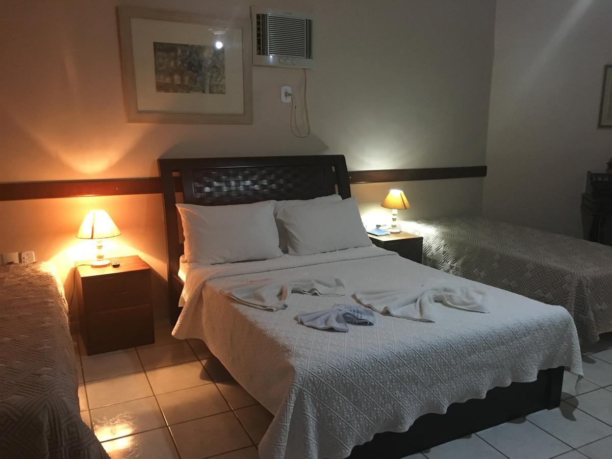 Hotel Pousada Caminho Da Praia กวาราปารี ภายนอก รูปภาพ
